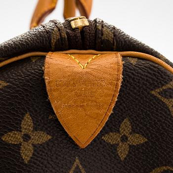Louis Vuitton, a Monogram Canvas 'Keepall 55' weekend bag.