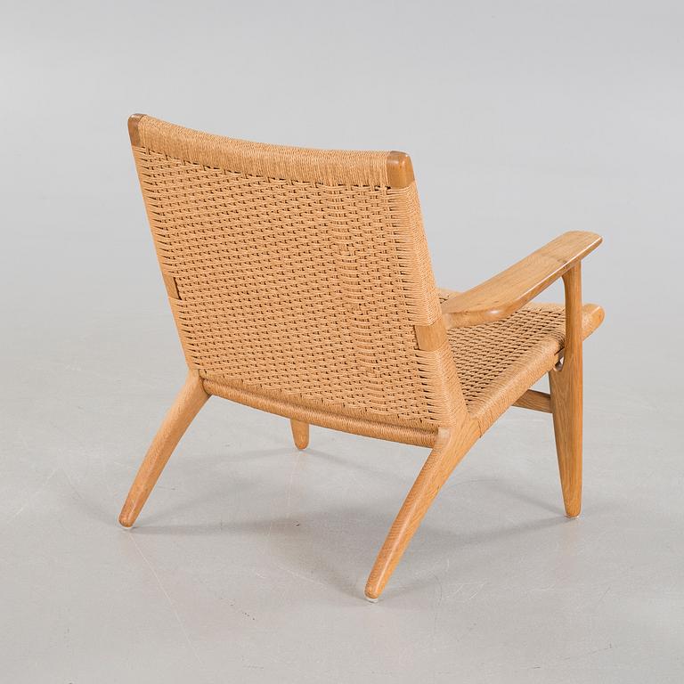 A lounge chair by Hans J Wegner, model "CH-25", for Carl Hansen & Son, Denmark, second half of the 20th century.