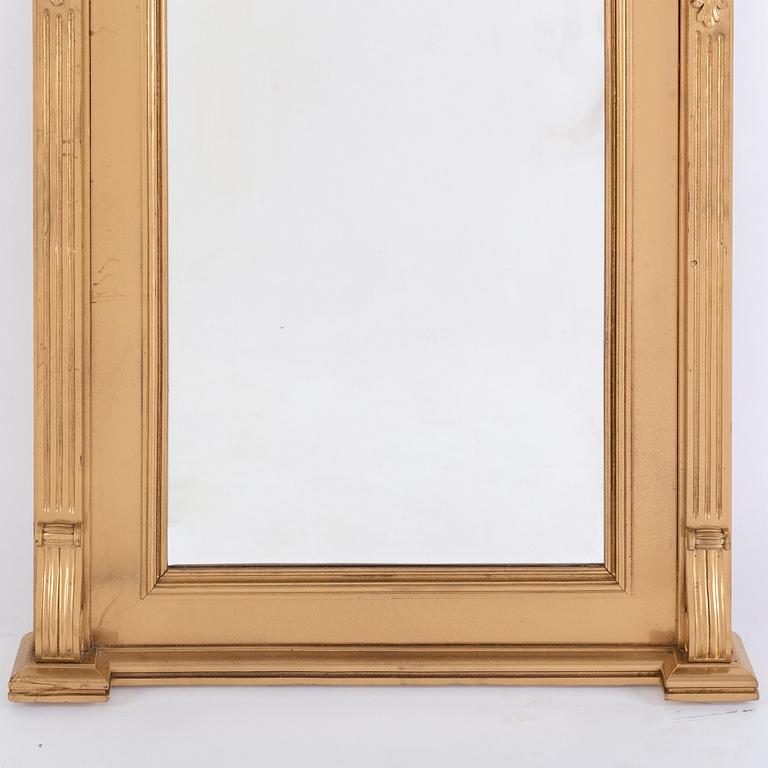 An end of the 19th Century rennaisance style bronzed mirror-.