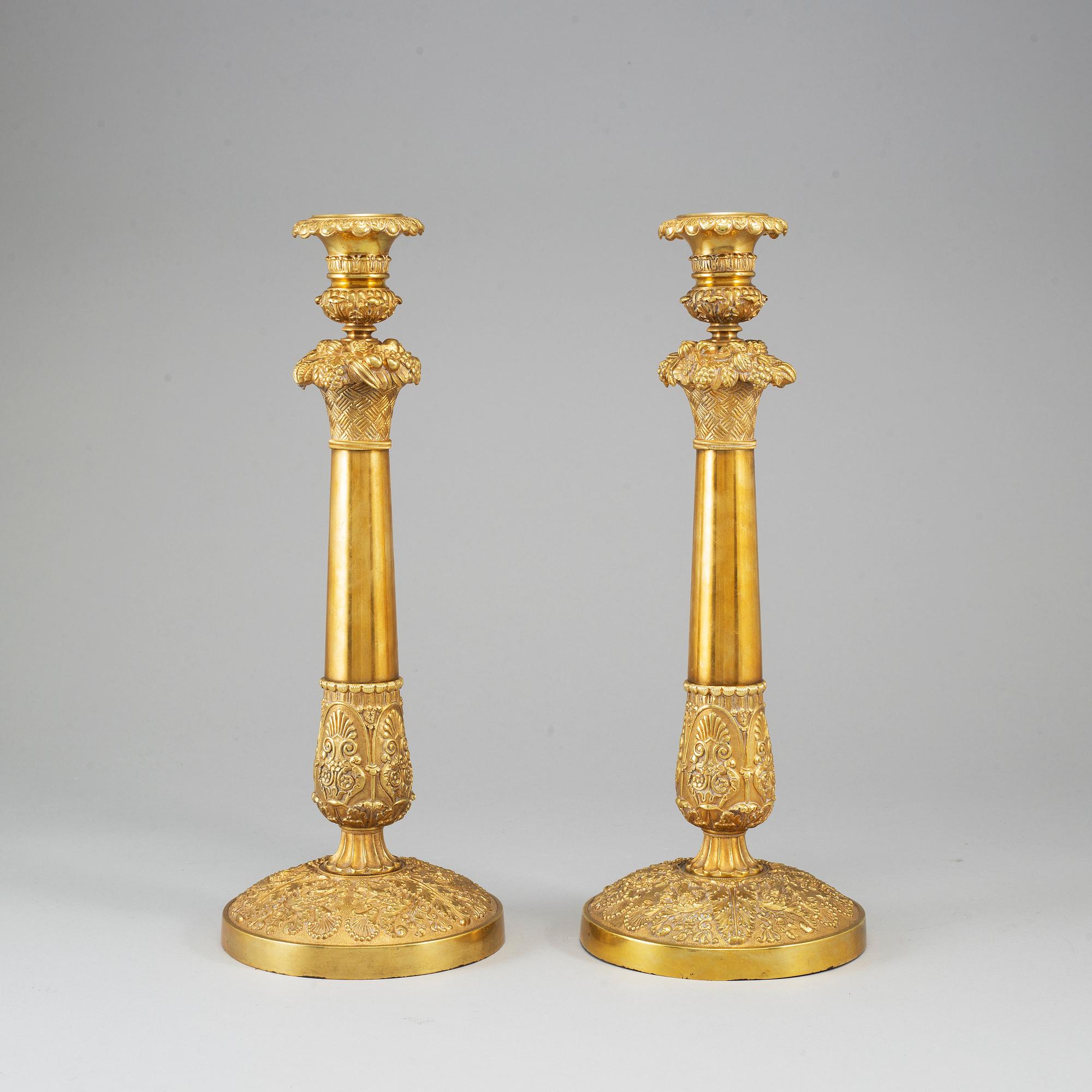 A pair of French Empire candlesticks, first half of the 19th century.