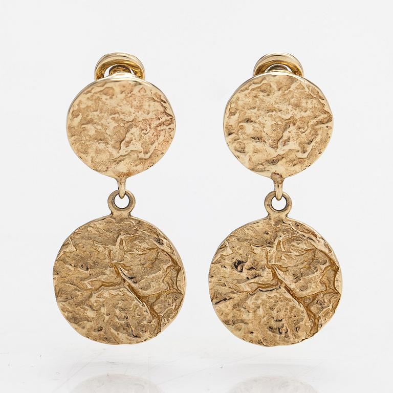 Cassandra Goad, a pair of 9K gold 'Tortilla Double' earrings. London.