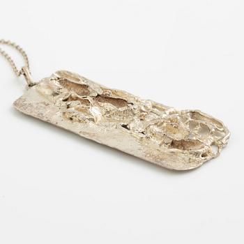 Lars Arby, four pendants with a chain and a neck ring, silver, Gothenburg 1965, 1969, 1976 and 1982.