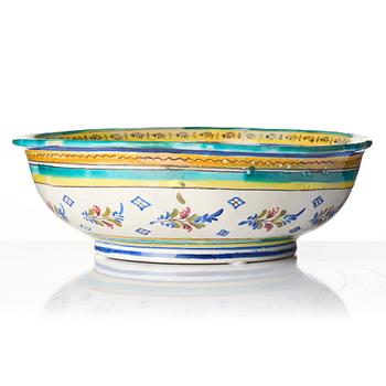 A polychrome faiance dish, probably 18th century.