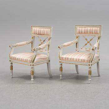 A set of two armchairs, a sofa, a stool and a chair. Early 20th century.
