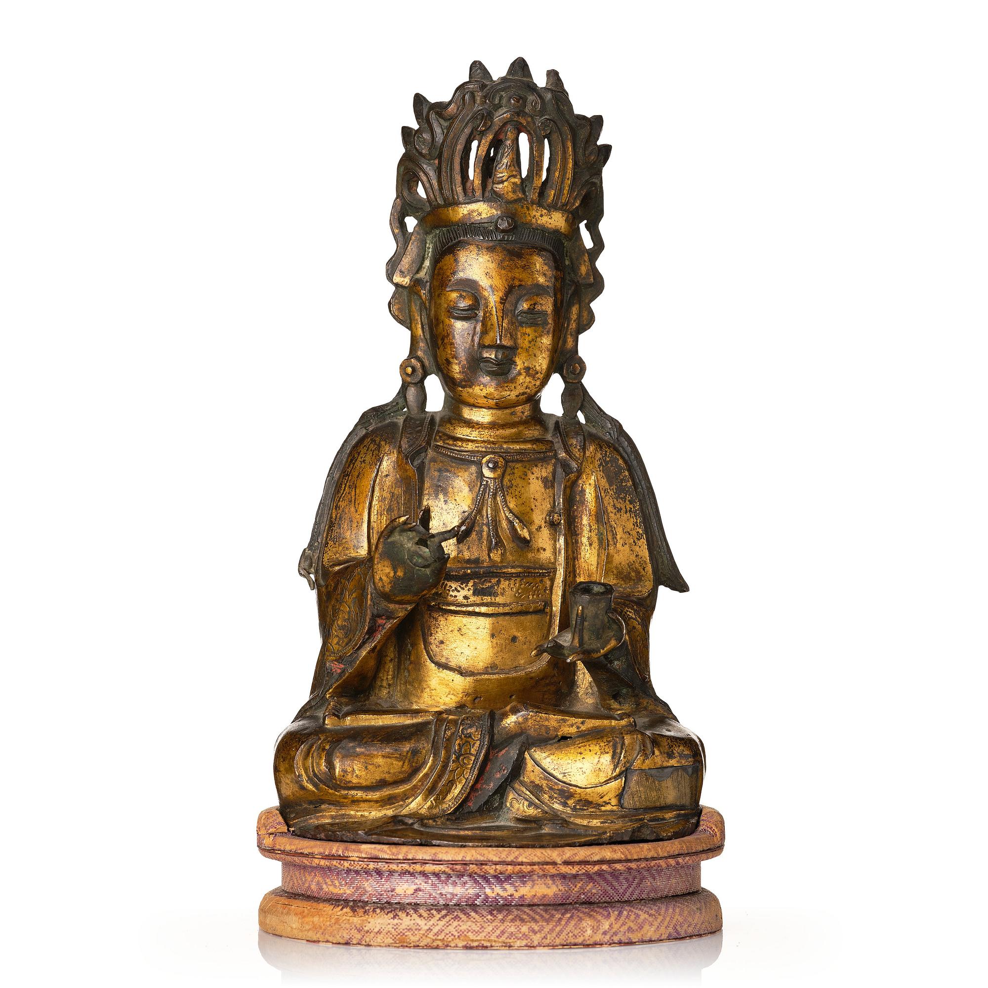 A gilt bronze figure of Guanyin, Ming dynasty, 16th/17th Century.