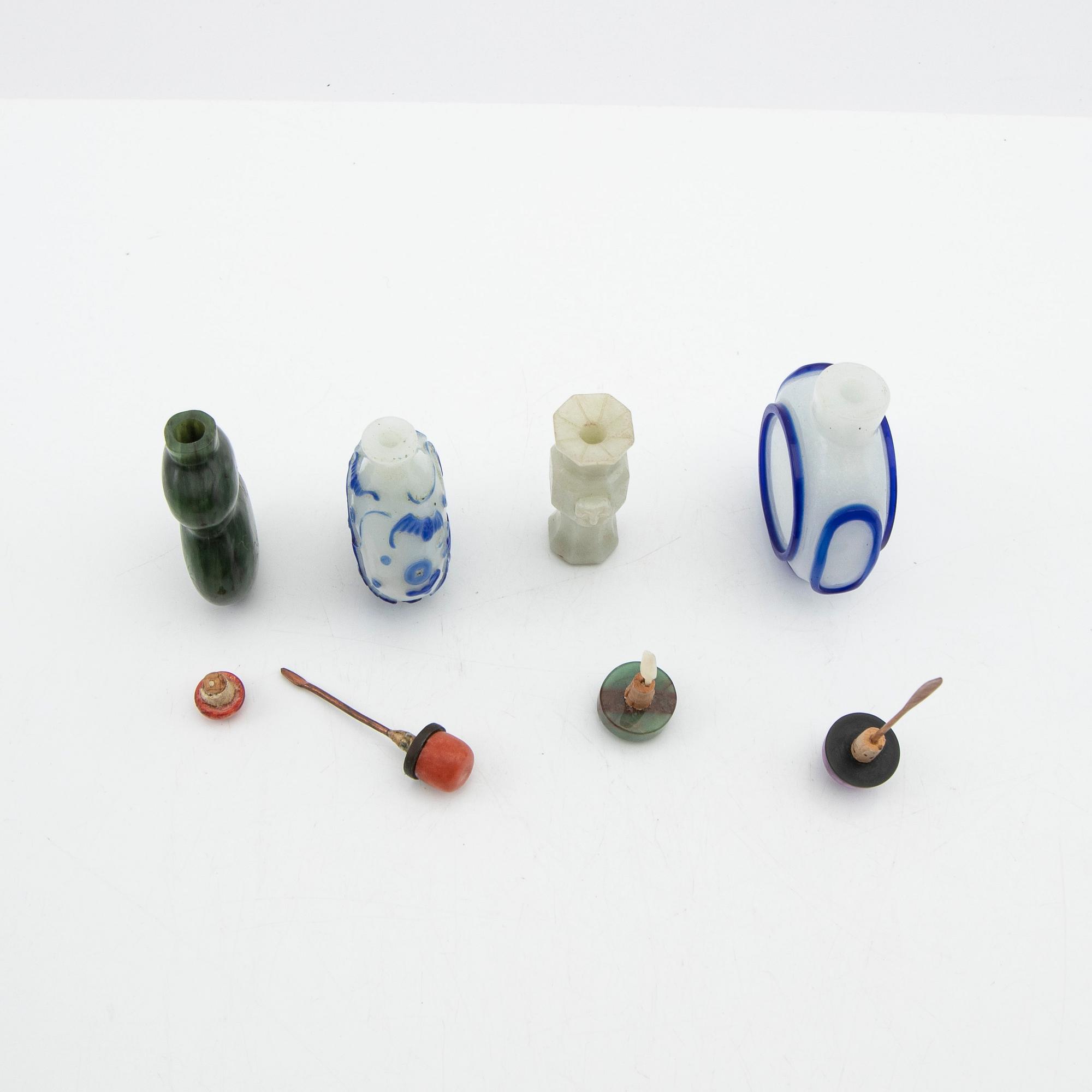 Snuff bottles, four pieces of Peking glass and stone. China, 20th century.