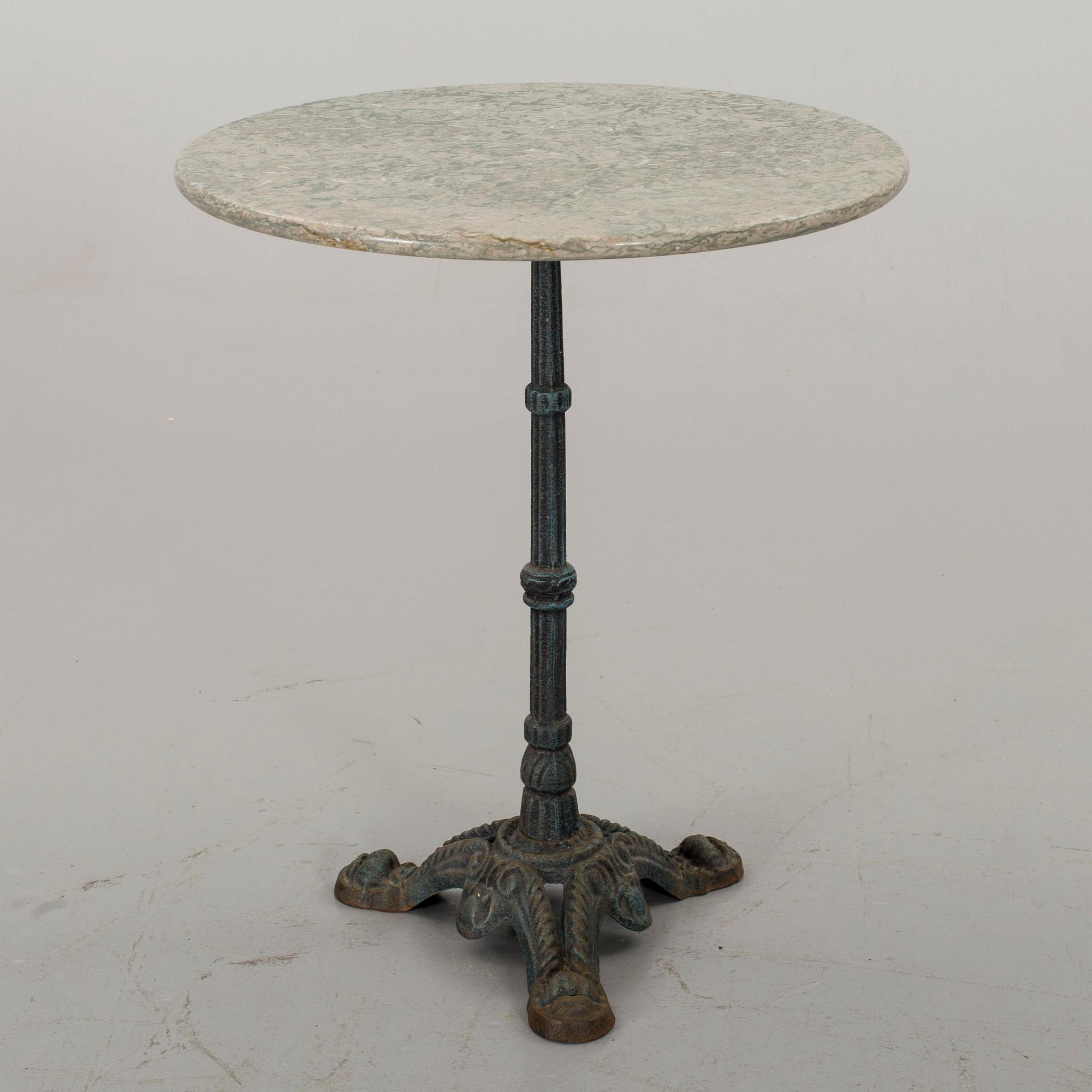 A IRON GARDEN TABLE.