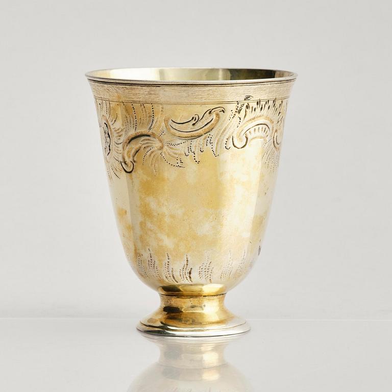 A German 18th century gilt-silver beaker on foot, mark of Johann Gottfried Hildebrand, Berlin probably 1760s.