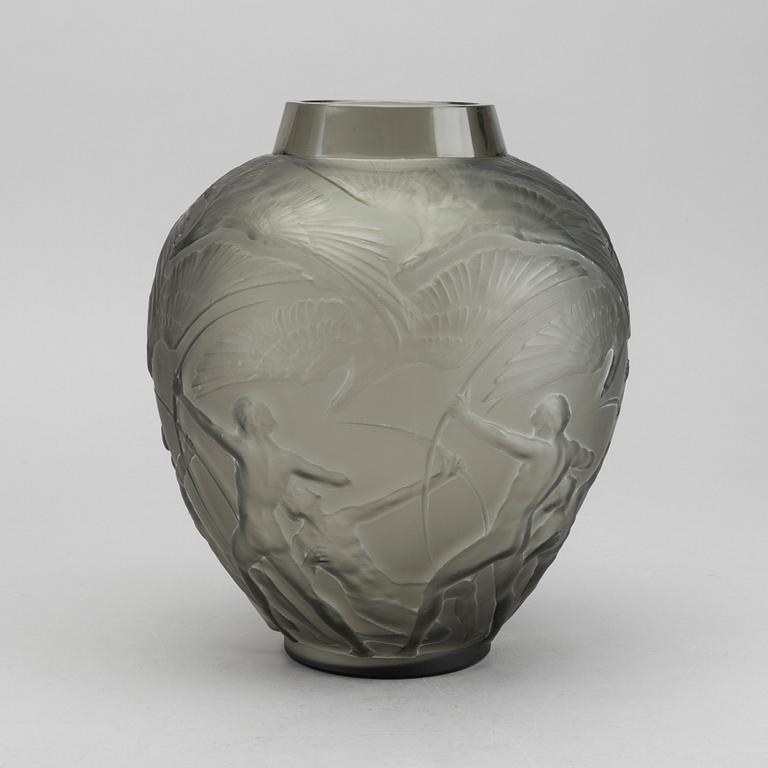 René Lalique, an "Archers" moulded smoke-coloured glass vase, model nr 893, France, post 1921.