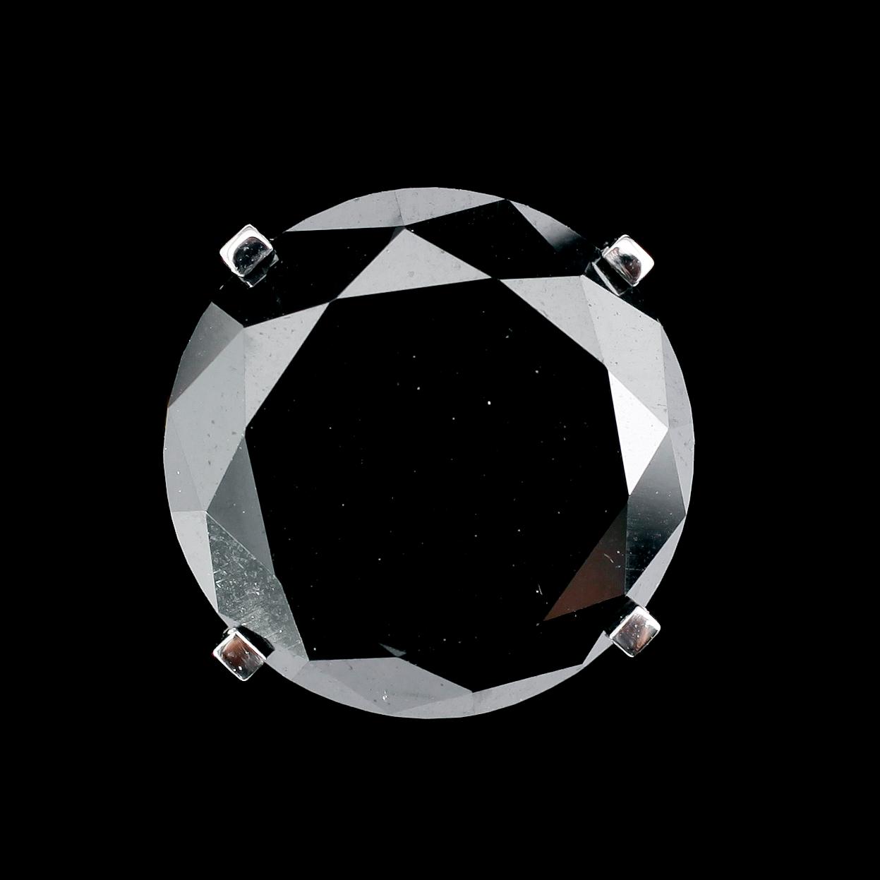 RING, 18 k vitguld, solitär svart briljantslipad diamant ca 18.40 ct.