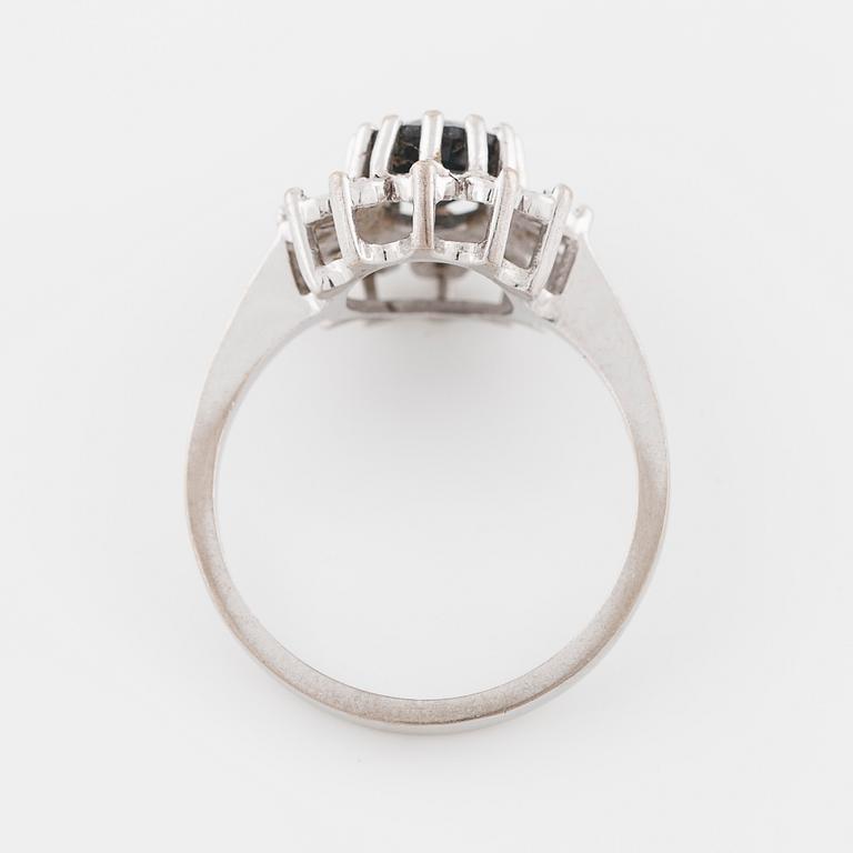 A sapphire and brilliant cut diamond ring with Swedish hallmark.