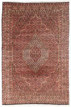 An oriental carpet, ca 293 x 196 cm.