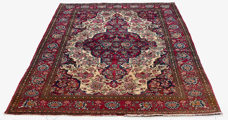 An antique Isfahan rug, Central Persia, c 234 x 146 cm.