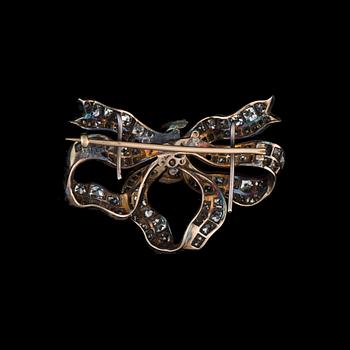 A BROOCH, gold and silver, old cut diamonds. Weight c. 17.8 g.