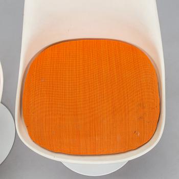 Eero Saarinen, A 'Tulip' furniture set, table with eight chairs, Knoll International, 1970s.