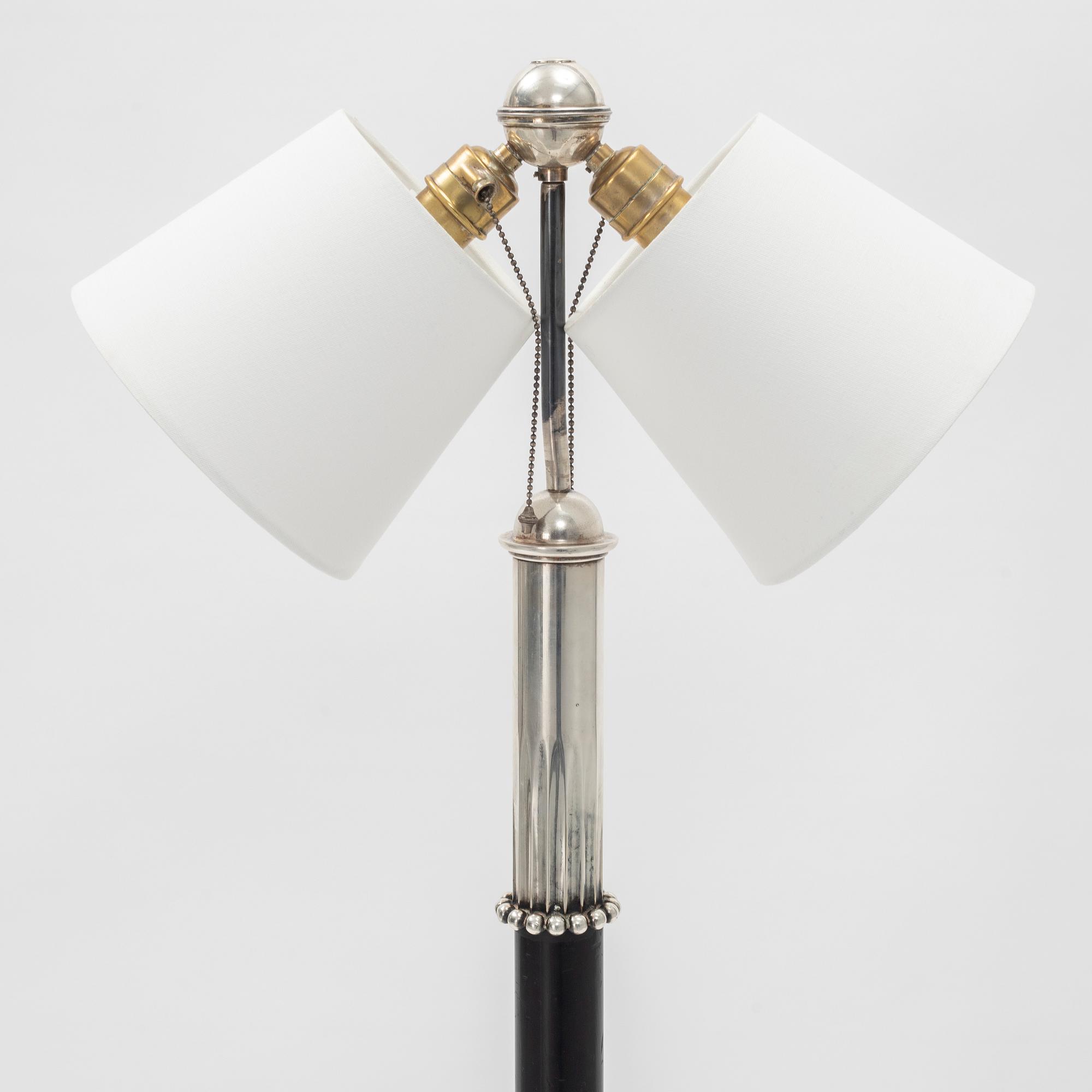 Elis Bergh, a Swedish Grace silver plated floor lamp, C.G Hallberg, Stockholm 1920s-1930s.