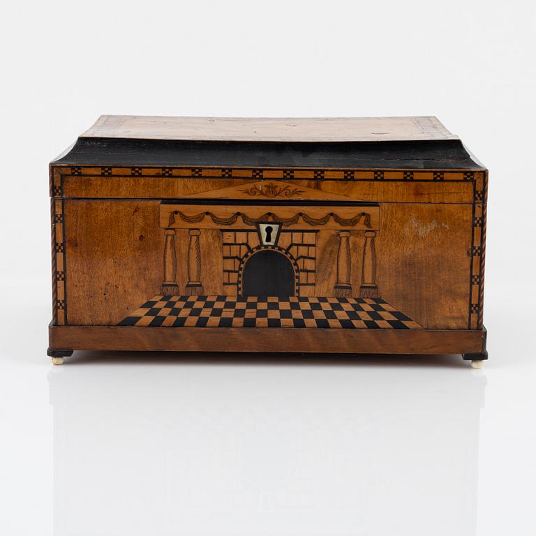 A mahogany-veneered box, first half of the 19th century.