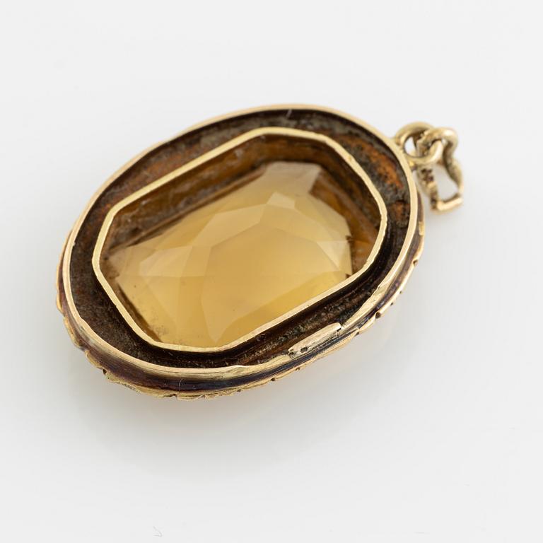 Gold and citrine pendant.