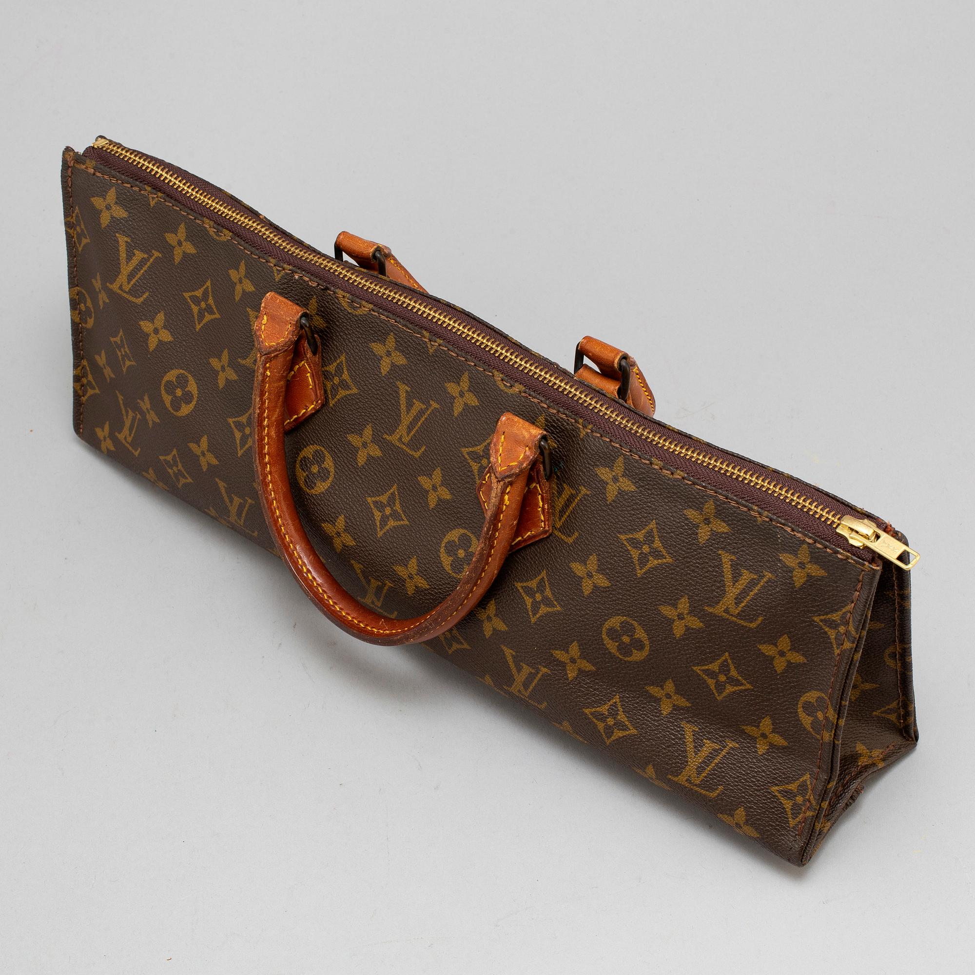 Sac triangle louis vuitton hot sale