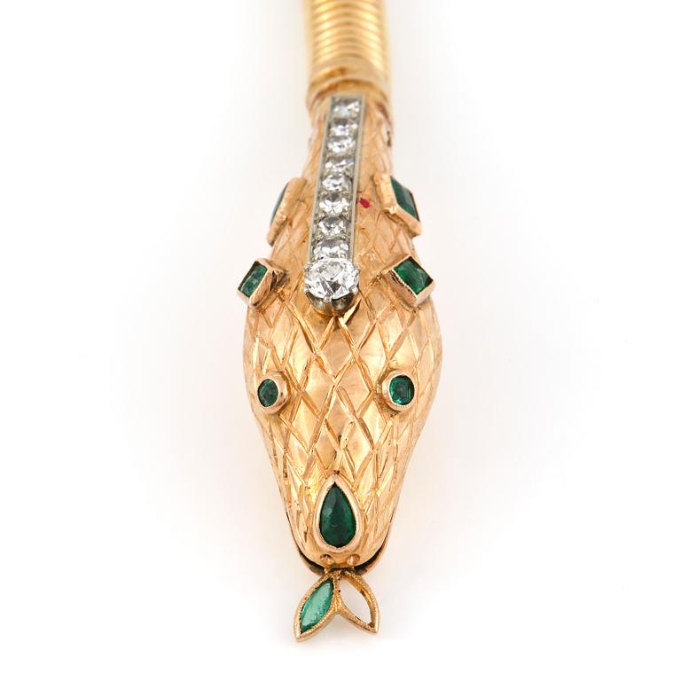 An emerald and diamond necklace in the shape of a serpent. Total carat weight of diamonds circa 1.00 ct.