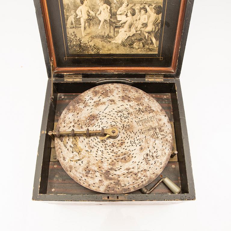 Polyphon wooden music box with sevem discs, around 1900's.