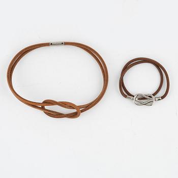 Hermès, a leather necklace and bracelet.