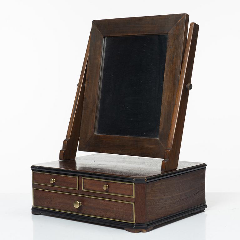 A mahogany table mirror, Sweden, dated 1820.