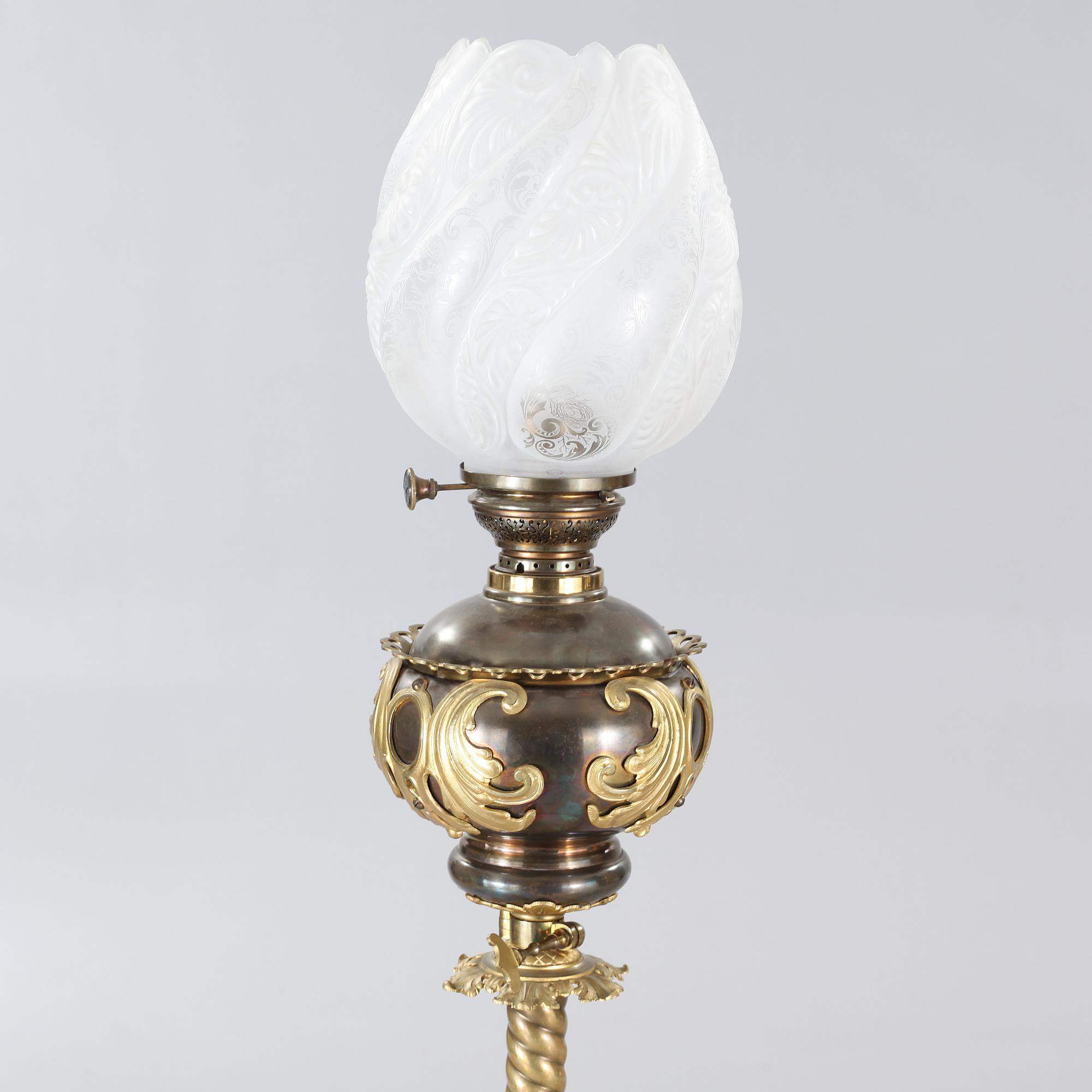 Two floor parafine lamps, 20th century.