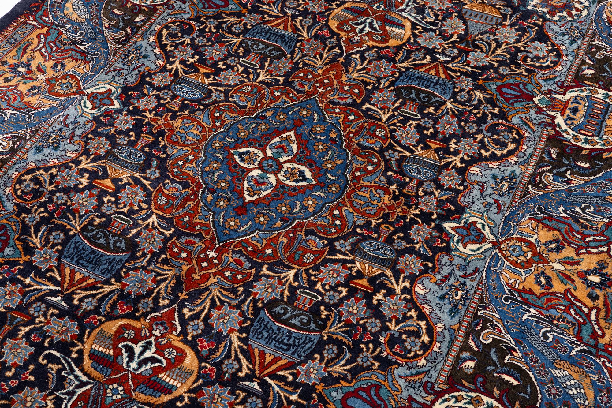 A Kashmar carpet, c. 295 x 198 cm.