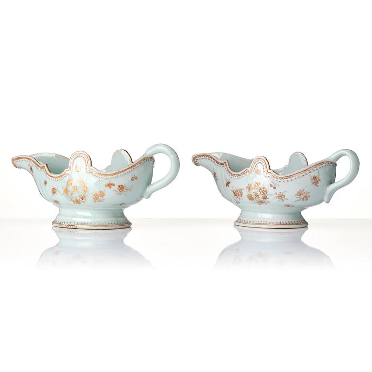 A set of two iron red and gold sauce boats, Qing dynasty, Qianlong (1736-95).