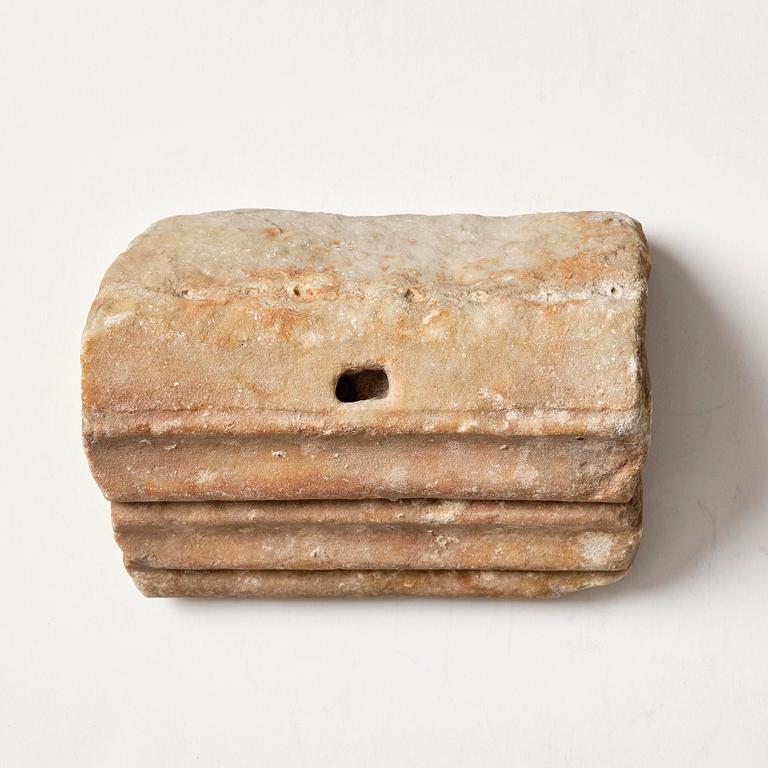 A presumably Hellenistic marble part of a frieze.