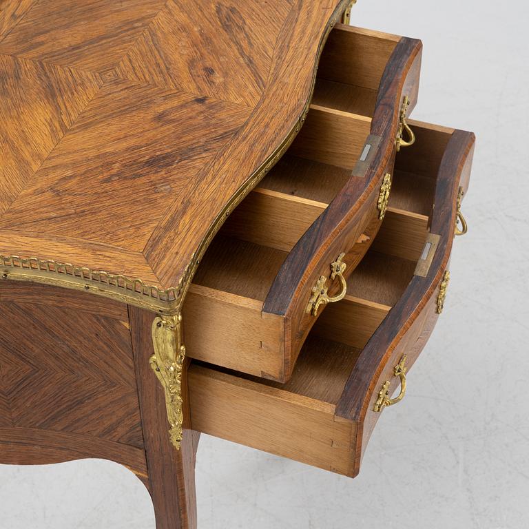 A Louis XV style dresser, 20th Century.