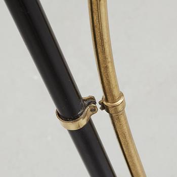 A Swedish Modern brass and black lacquered floor lamp, 1950's.