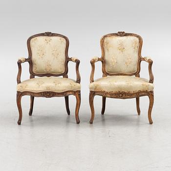 A Pair of Louis XV Beechwood Armchairs, 18th Century.