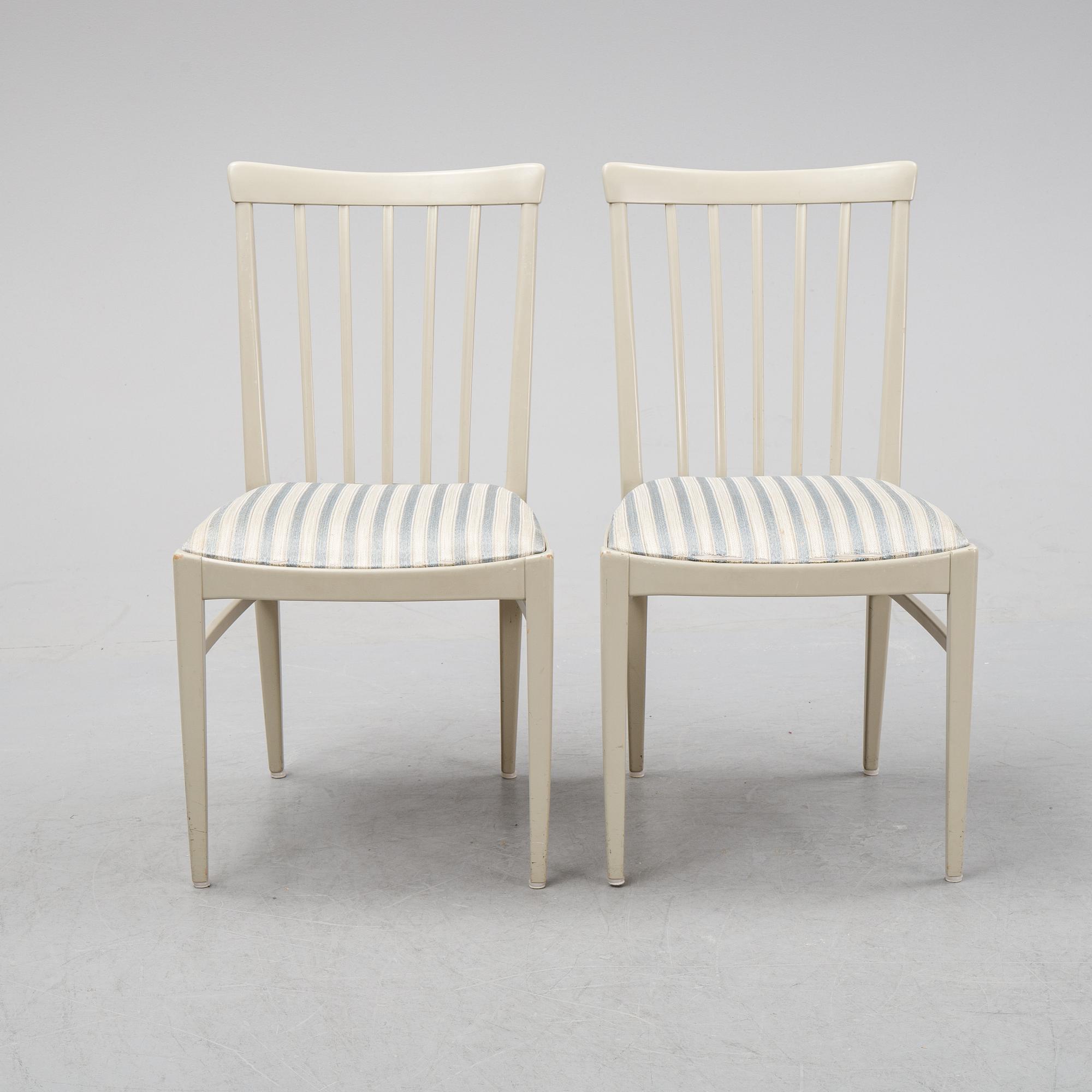 A dining table and six chairs by Carl Malmsten for Bodafors.