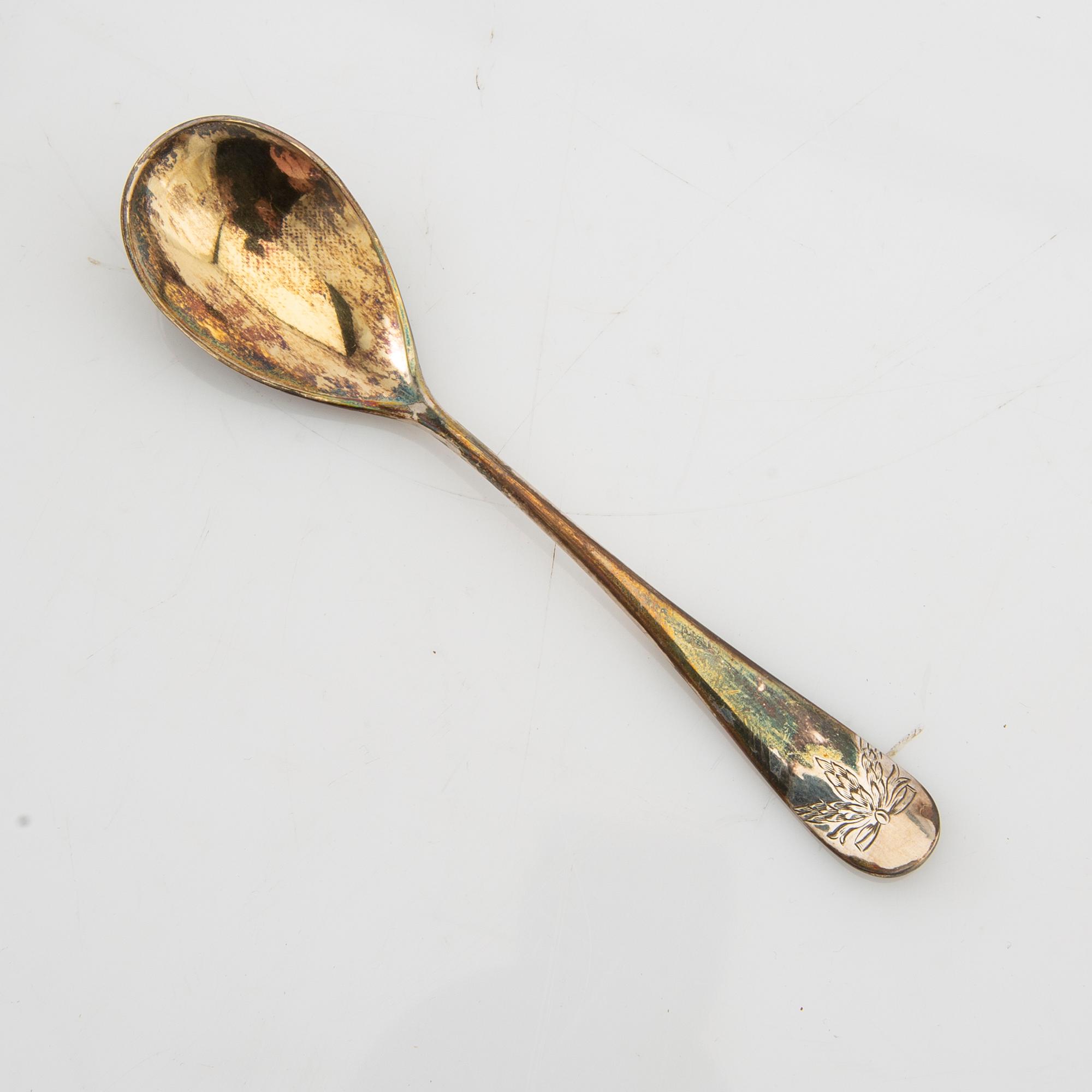 Egg cup with spoon and odd egg cup silver Swedish import marks.