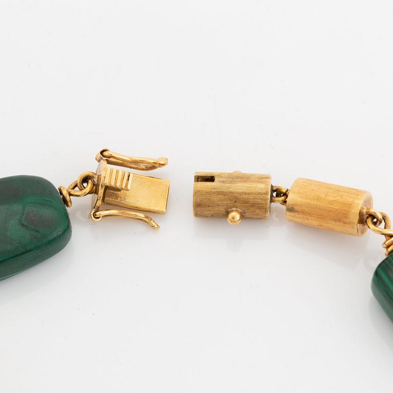 A 14K gold and malachite bracelet.