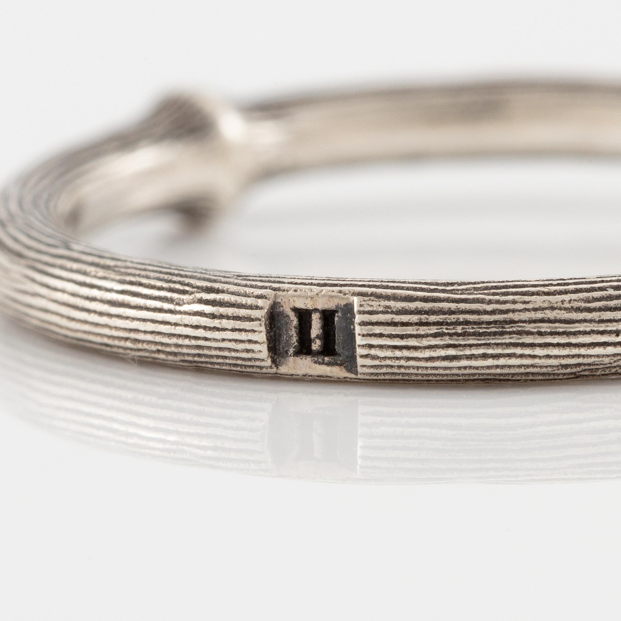 Ole Lynggaard, rings, 2 pcs, silver. With cabochon-cut grey moonstone.