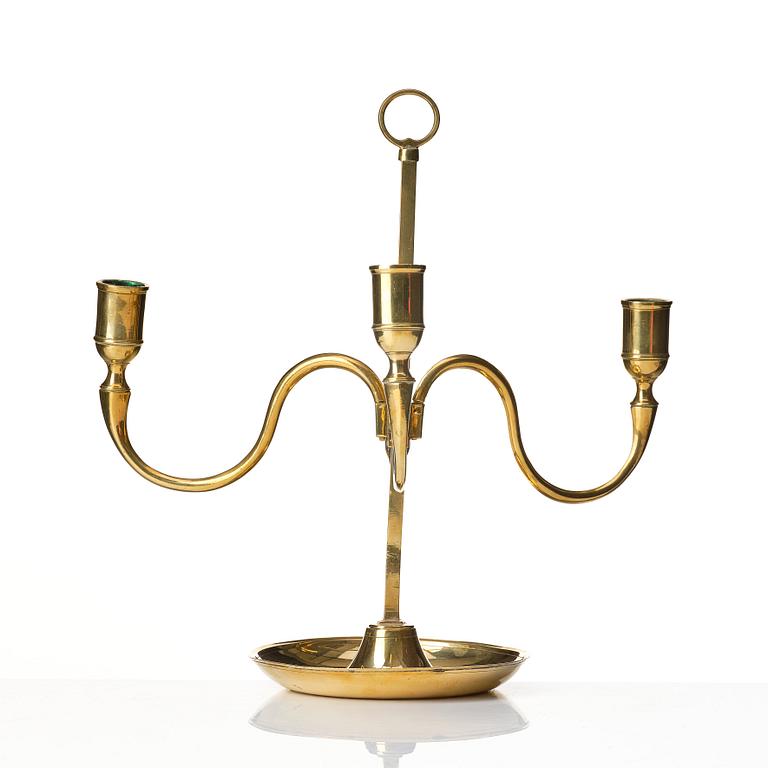 A Gustavian brass three light candelstick.