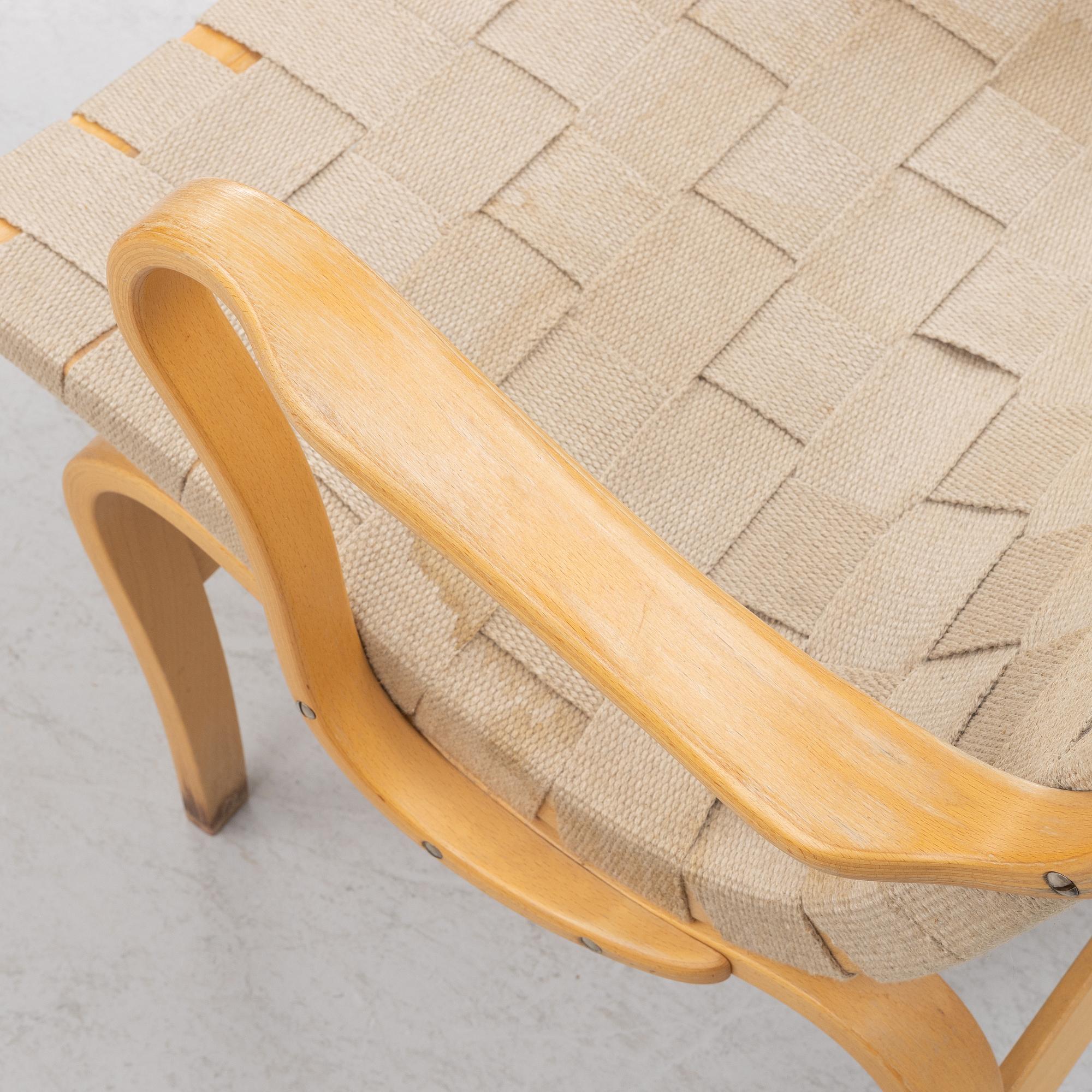 Bruno Mathsson, a pir of 'Eva' armchairs, Dux, late 20th century.