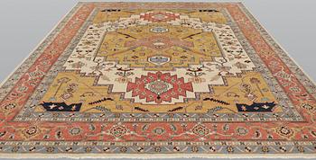 A carpet, Heriz design, approx. 351 x 269 cm.