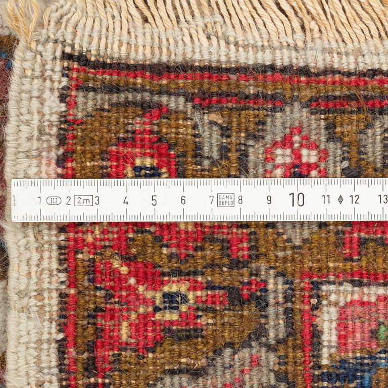 A Tabriz carpet, c. 390 x 305 cm.