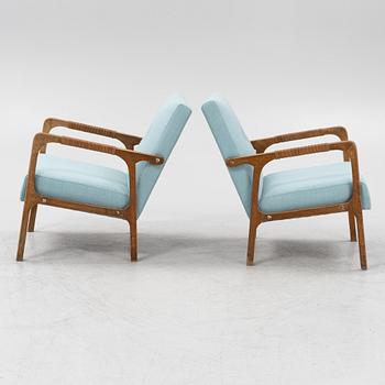 a pair of 1950's armchairs.