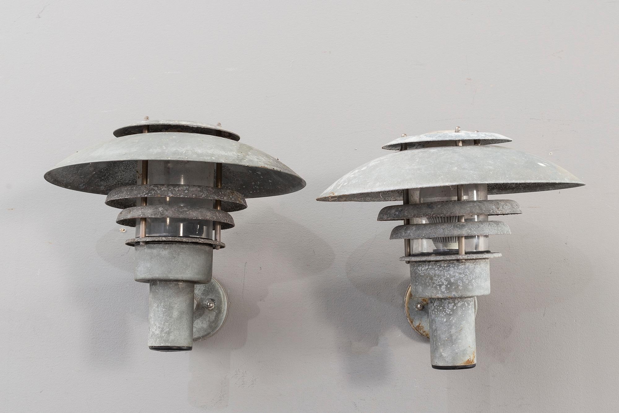 A pair of late 20th century outdoor lights.