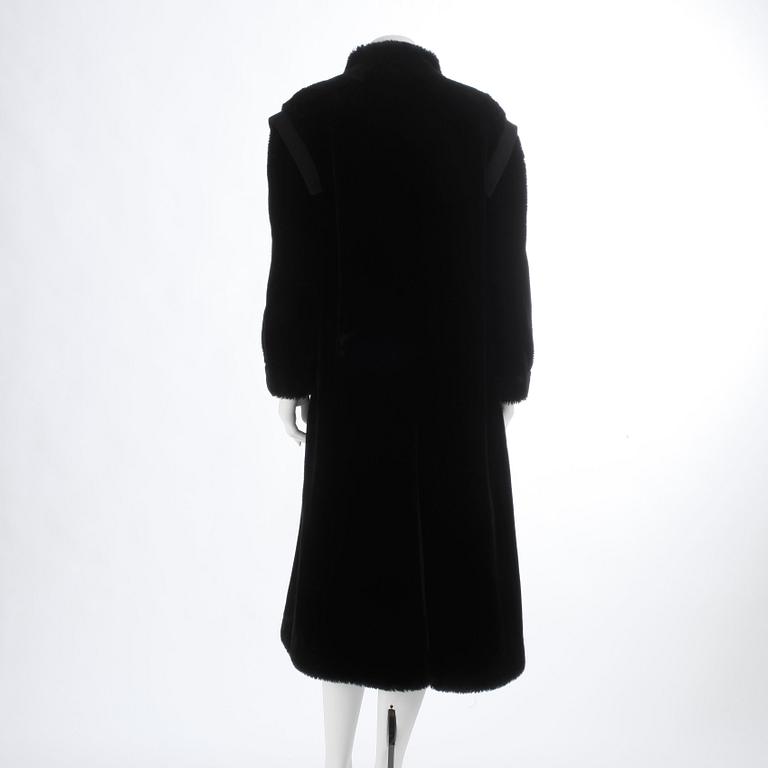 SONIA RYKIEL, a faux fur black coat.