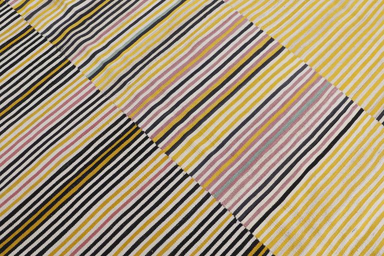 A carpet embroided flat weave, ca 304 x 253 cm.