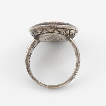 Silver ring with coral and marcasites and with black details.