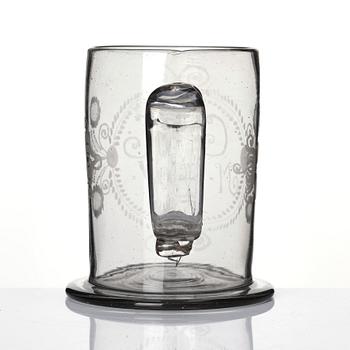 A large tankard, 18th Century with eched monogram for 'G.R.G' and 'M.E.W.' 1781.