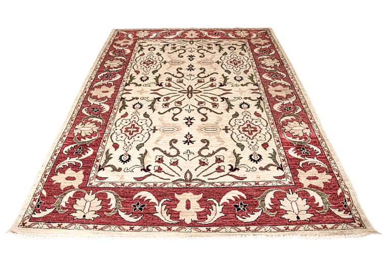 A rug, Ziegler design, ca 231 x 176 cm.