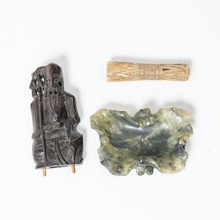 A Chinese green stone brush washer, a carved bone and a soapstone figure, partly Qing dynasty.